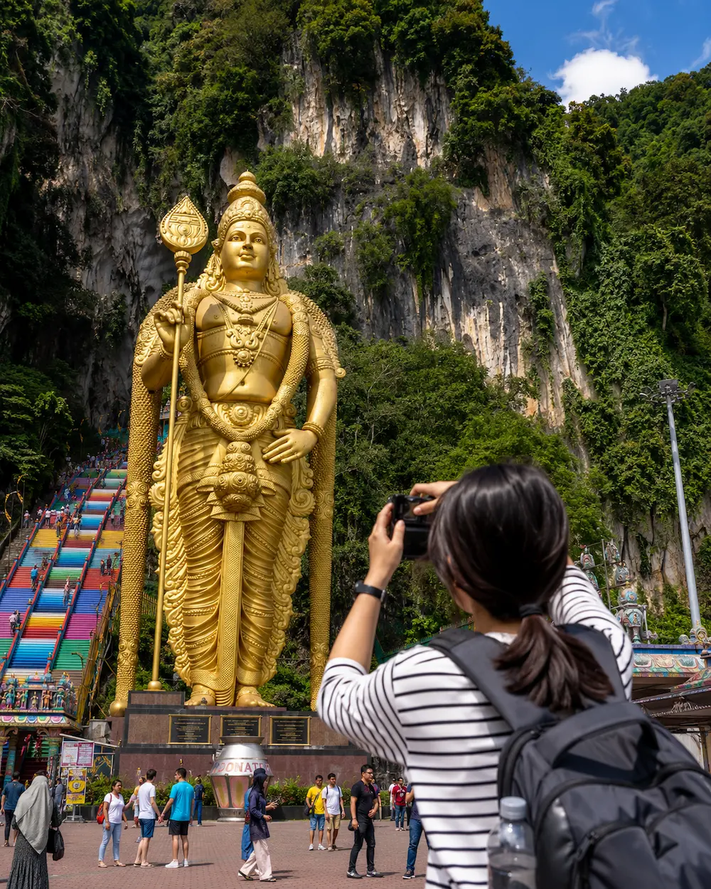 Travelers reviewing a Malaysia itinerary map